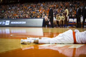 Chris McCullough lies on the baseline after tearing his right ACL during the first half of Sunday's game. The official diagnosis came on Monday and although the freshman is out for the season, he said he'll remain upbeat.