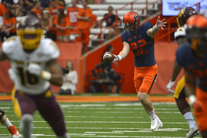 Syracuse punter Riley Dixon converted on a fake punt on Saturday against Virginia. He's played a key role in several games this season, including against Central Michigan, pictured above.