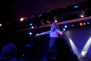 Milk, a former contestant of RuPaul's Drag Race, performs the opening routine of the 2014 Totally Fabulous Drag Show Preliminaries dressed as a flight attendant.