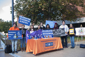 The Indigenous Students at Syracuse organization, Indigenous Graduate Students and Office of Multicultural Affairs set up a table in front of the Schine Student Center on Monday. 