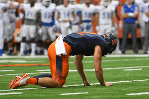 Eric Dungey said he will run less this year, yet in the season opener he was SU's most effective threat on the ground Friday night. 