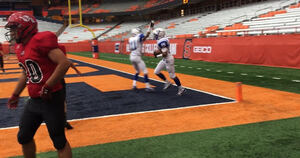 MeSean Johnson (No. 15) put Ogdensburg up 22-0 with a nine-yard touchdown run, which he celebrates here. 