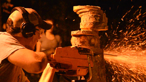 A member of the Woodsmen competes in the 