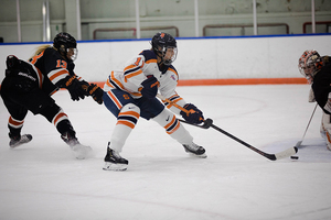 Kelli Roswell, pictured earlier this season against Princeton, worked a shot toward the net. 