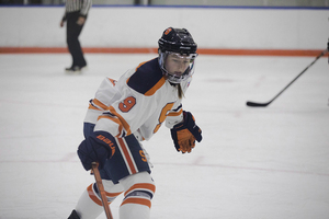 Allie Munroe skates in a game earlier this season.