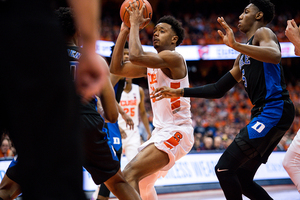 Elijah Hughes pulls up for a shot in the paint against Duke last month.