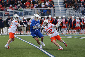 Jamie Trimboli drives past a Duke defender two weeks ago.