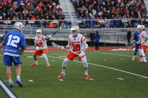 Andrew Helmer plays both short-stick defensive midfielder and long stick midfielder for the Orange