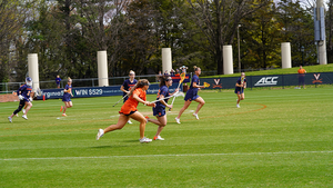 Maddy Baxter notched a career-high five goals to lead No. 7 Syracuse to a 15-14 win over No. 9 Virginia Saturday. 