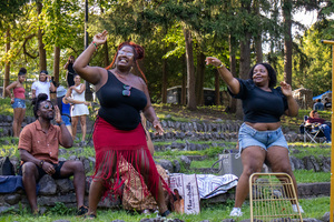 SeQuoia Kemp (left) and Etije Walker (right) dance on the steps of the Thornden Park Amphitheater during the Black Artist Collective Freedom Festival. People enjoyed sets by DJ Pentiwaa after comedian Andre Thompson's stand-up comedy performance.