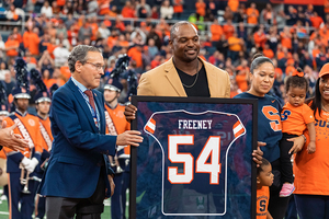 At halftime of Syracuse’s game against No. 23 Georgia Tech Saturday, the Orange honored Hall of Fame defensive lineman Dwight Freeney by retiring his No. 54 jersey.