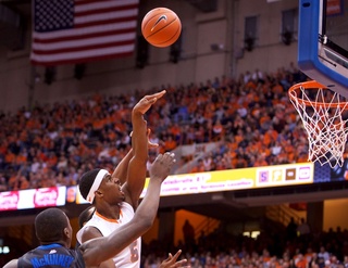 C.J. Fair attempts a runner in the lane over two DePaul defenders. Fair finished the game with 16 points on 7-of-16 shooting from the field.