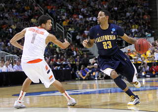 Allen Crabbe #23 of the California Golden Bears drives to the basket against Michael Carter-Williams #1 of the Syracuse Orange.