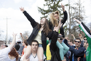 Students dance to Sound Remedy at MayFest, Friday afternoon.