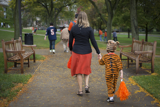 A young Clemson fan and his mother make their way to the Carrier Dome.