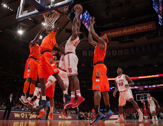 St. John's Chris Obekpa goes for a shot in the paint. 