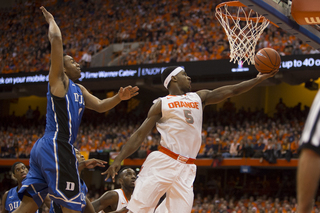 Fair blows by Parker for a layup at the rim. 