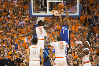 Parker finishes a reverse dunk over Jerami Grant. 