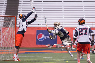 Goalie Dominic Lamolinara attempts to make a save. He allowed five goals and made seven saves in the first half before being replaced by Bobby Wardwell.