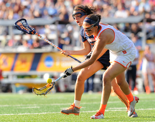 Orange attack Alyssa Murray looks to secure a loose ball.