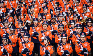 The SU marching band performs outside of Hendricks Chapel before kickoff. 