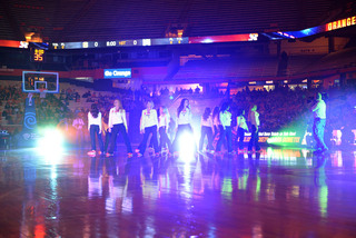 The Syracuse dance team puts on a show during a break in action. 