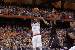 Forward B.J. Johnson fires a contested jumper from the right wing. The sophomore had six points on 3-for-10 shooting from the field.