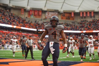 After getting into the end zone, Strickland looks up into the crowd. He had 28 yards rushing.