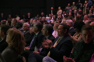 More than 200 people, including Chancellor Kent Syverud, gathered in the Redhouse Arts Center in downtown Syracuse.