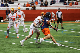 Austin Fusco (right) defending an UVA attack. 