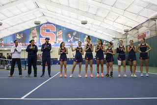 Syracuse lines up before the match.