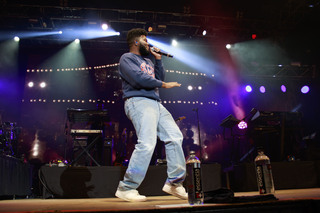 Khalid struts across the stage as he starts his set.