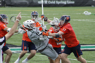 Syracuse often sent multiple defenders at Tewaaraton Finalist Pat Spencer