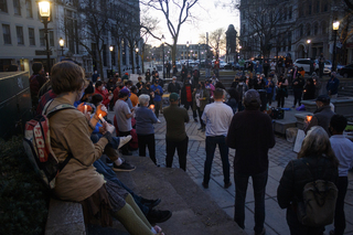 Nada Odeh addresses the crowd after a moment of silence for the victims of the most recent act of violence against the Asian American community.