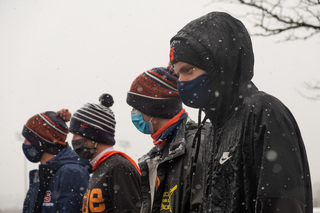 The men's cross country team marches in support of justice for Black athletes, administrators, coaches and students.