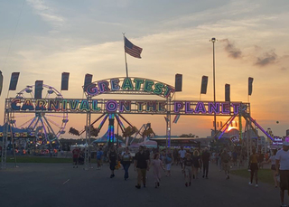 The entrance to the ride section of the New York State Fair reads 