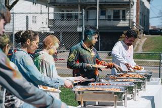 Samosas, gulab jamun, and other South Asian delicacies were served at the Holi event.