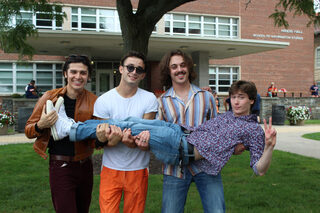 Rhodes Corduroy strikes a pose right as they jump off the stage. The student band consists of Aidan LaBella, Zach Franze, Cooper Lang and Mitch Weisz.